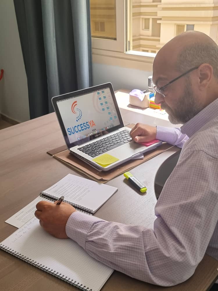 Mohamed Attia working with the SuccessYA plan